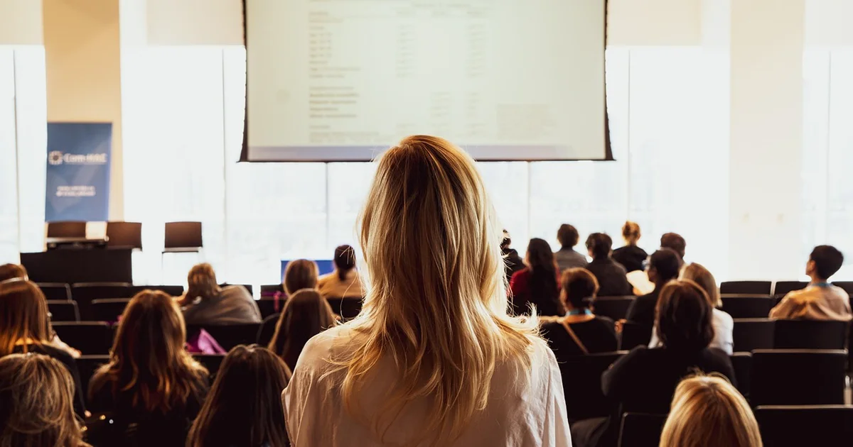 Show a student engaging in university activities that build soft skills